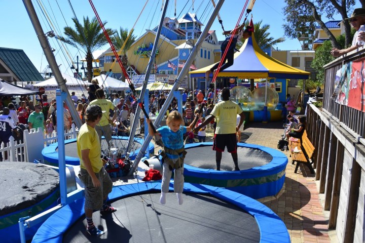 a group of people standing on a boat